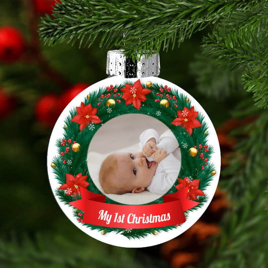 A baby's first Christmas ornament with a photo to hang on the Christmas tree.