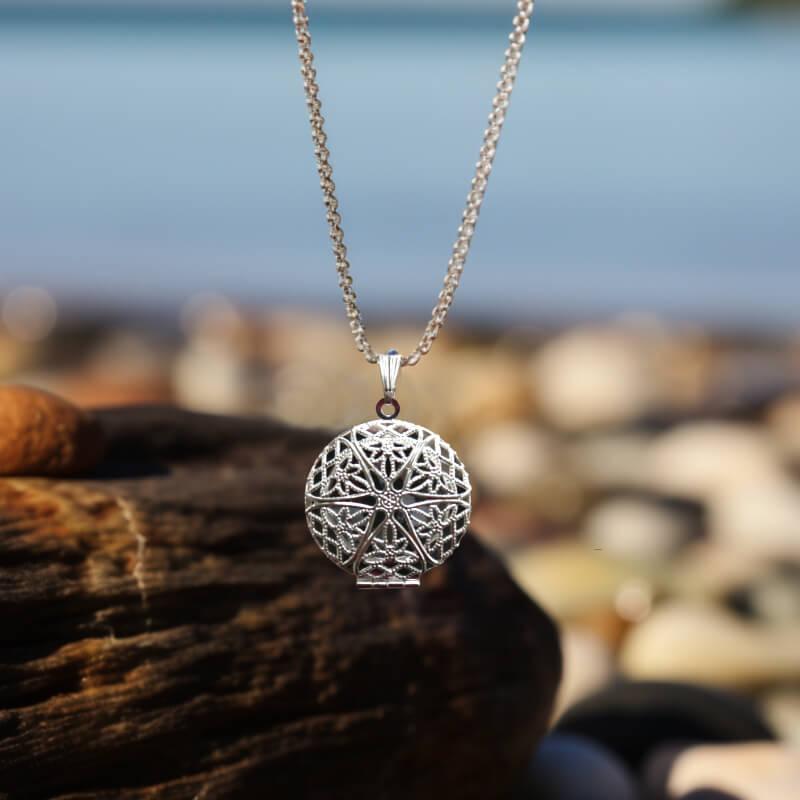 Round filigree necklace locket on silver chain with photo inside. Custom made in Sligo, Ireland.