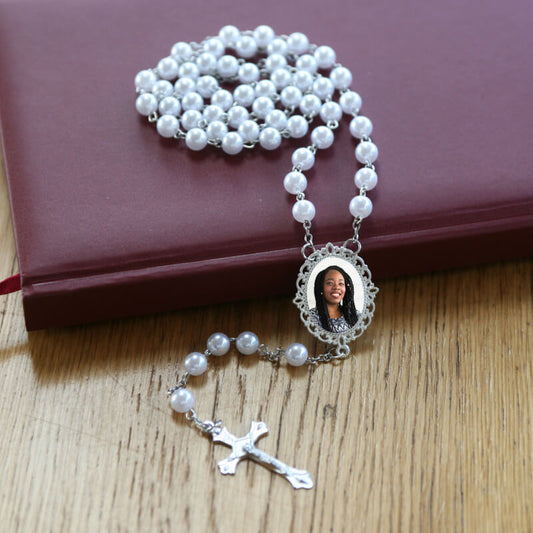 Rosary beads with a personalised photo picture, ideal for remembering someone special.