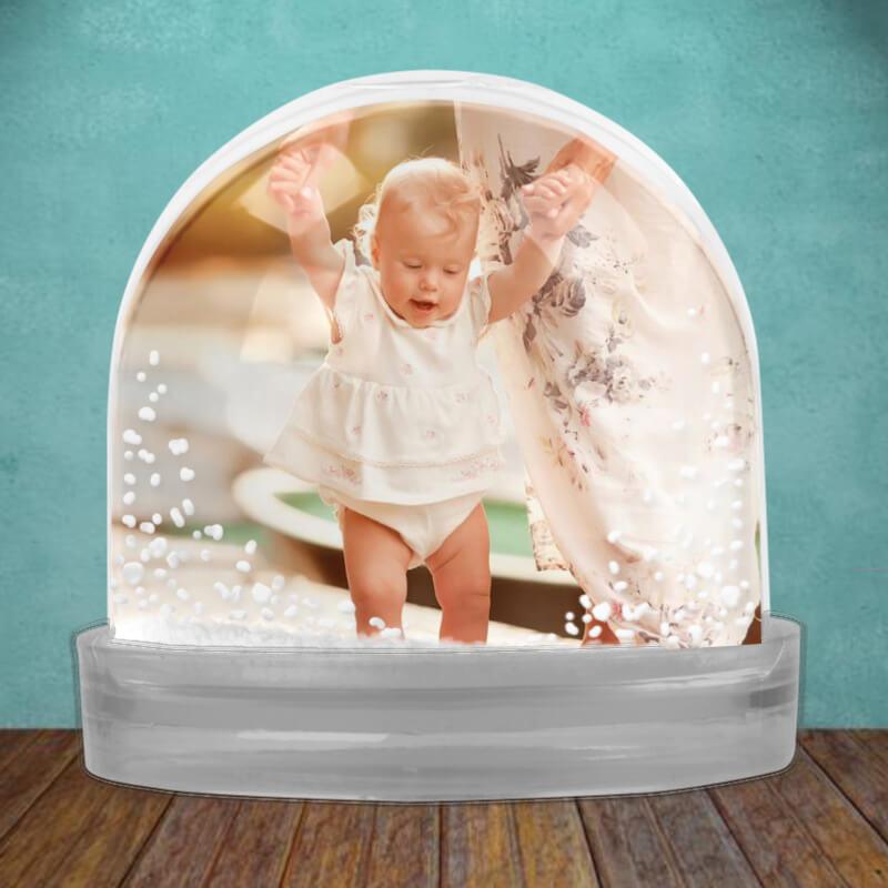 Personalised snow globe with two photos inside. This gift has fast delivery in Ireland, available.