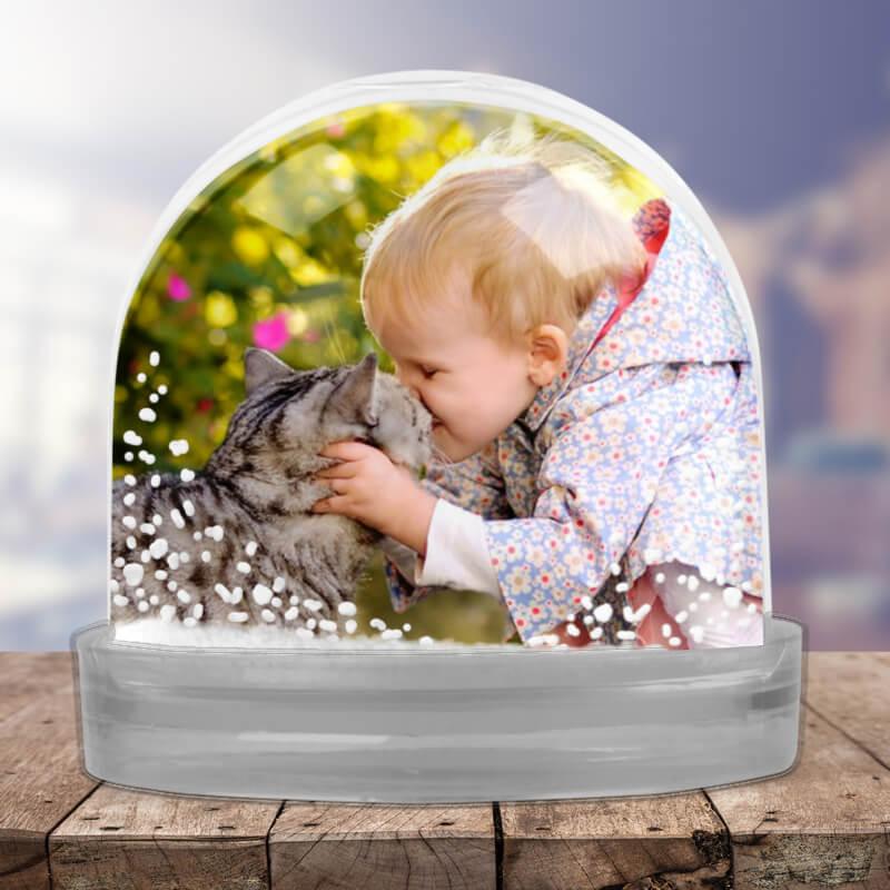 Have some fun with a photo snow globe. Two photos will fit inside this personalised gift.