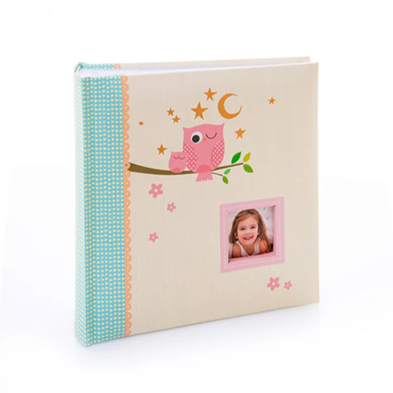 Pink cover of sleepy owl photo album for 200 photos in Ireland.