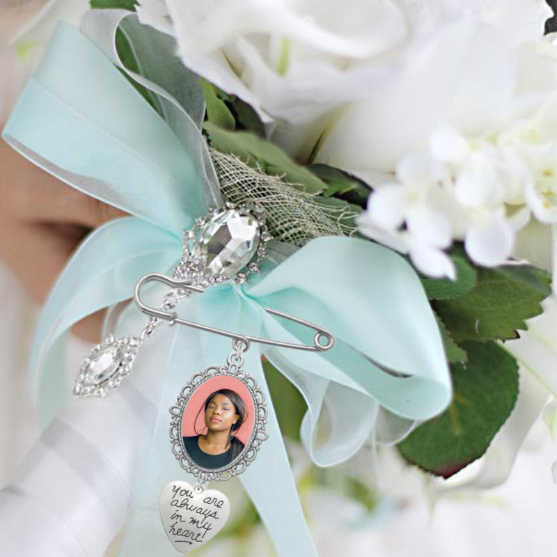 Bridal bouquet memory charm on a safety pin brooch backing featuring custom photo locket printing.