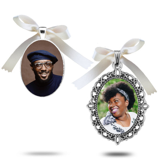 Two photo wedding memorial pendants with white ribbons, one featuring a man and the other a woman, with fast delivery in Ireland.