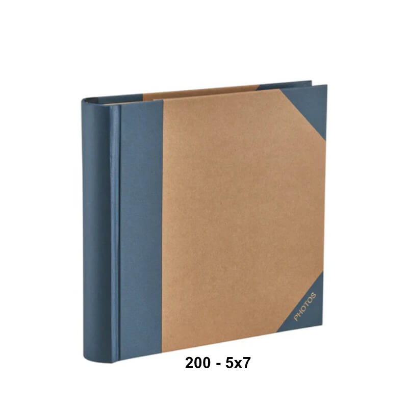 A blank photo album binder with a kraft brown paper cover and slate blue spine and corner accents, shown on a white background with the text '200 - 5x7' below it.