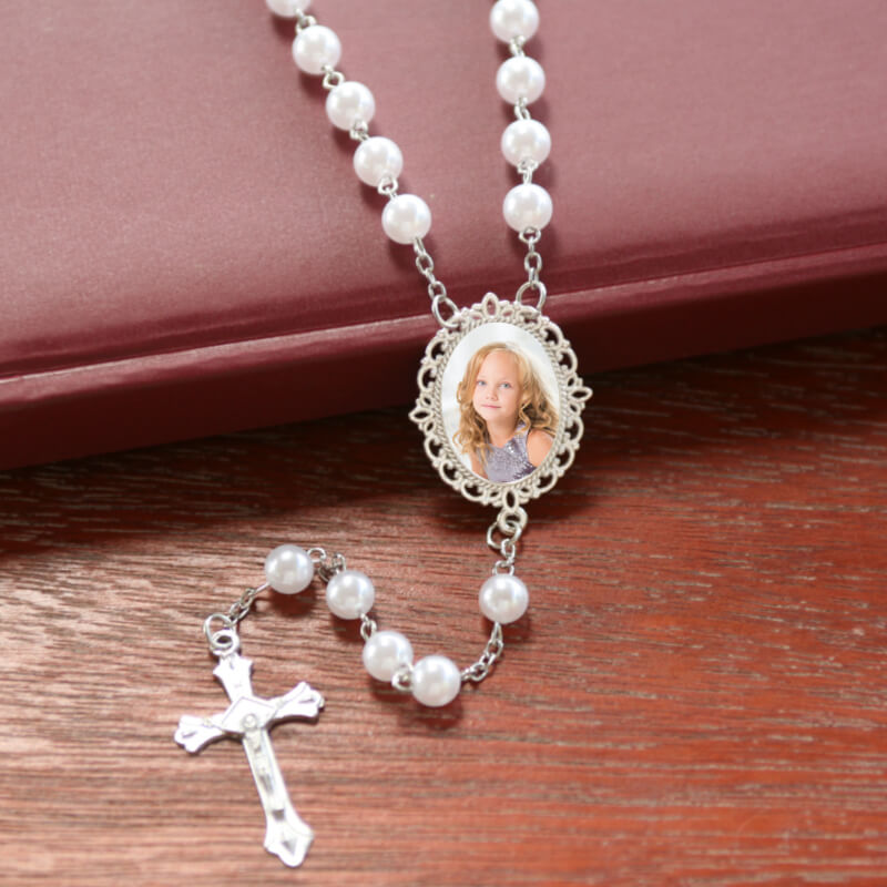 A great gift for first holy communion. This personalised custom made set of rosary beads has a photo included.