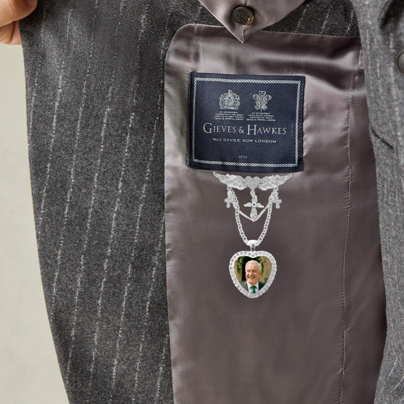 the rhinestone brooch and heart charm can also fit inside the groom's jacket, close to the heart.