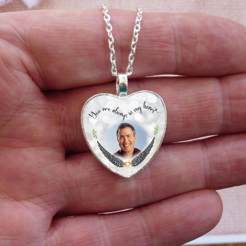 Custom-made photo necklace on a silver chain. Delivery is fast.